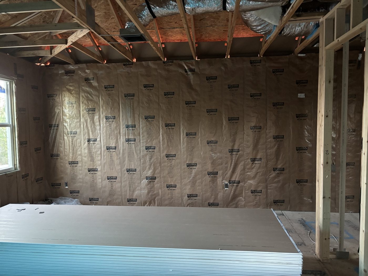 Faced batt insulation and drywall prep